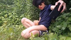 Twink Jon Arteen leaks precum fast as he fucks oiled Fleshlight outside