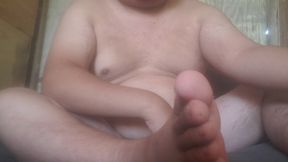 Masturbating