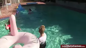 Four sexy babes strip and play with lucky guy in a pool