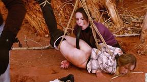 ”Degrading booty to mouth for two girls tied to tree outdoors”