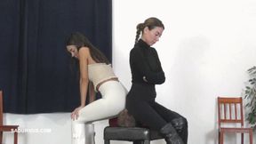 Slave's face under the leggings of Mistresses Olga and Natasa wmv