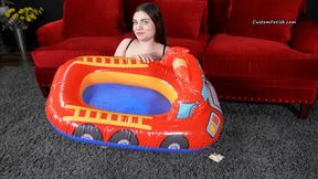 Emi Inflates an Inflatable Train by Mouth HD WMV (1920x1080)