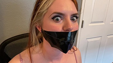 Cute Redhead Dirty Talks Through Her Duct Tape Gag!