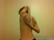 Topless Transgirl Shaking Own Hands Behind Her Back