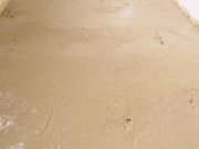 BBW Penny touching herself in a bath full of muddy clay