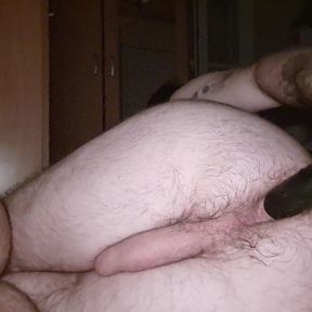 hairy man plays with his hairy ass and a dildo