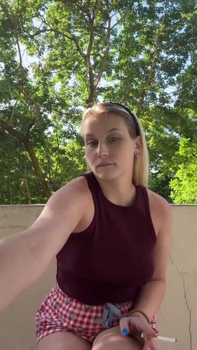 Amateur with big tits smokes