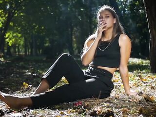 Seductive Russian Girl Smokin' Cigarette in Studio