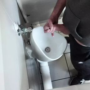 Wank at public toilet