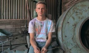 Gorgeous twink with blue eyes taking on a big penis