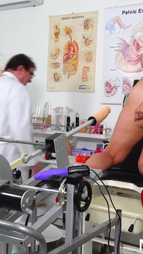Rectal speculum exam and machine orgasm of hot MILF
