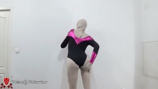 Putting on a leotard over a padlocked zentai