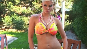 Gorgeous blonde fingering her wet pussy