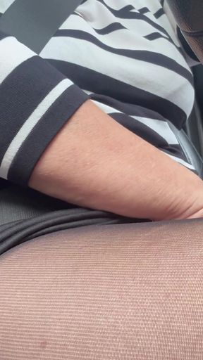 Elegant mature woman in nylon pantyhose driving home from the office   Clip 1