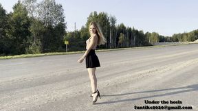 Karina walks in sandals