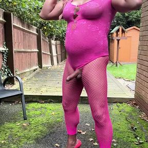 Crossdresser kellycd2022 in pink playsuit and fishnets