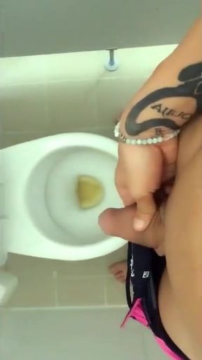 Tattooed Twink Is Pissing in Waterpark Piss Filled Toilet
