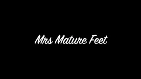 Mrs. Mature Feet Strips off her leopard print dress to reveal layering 467