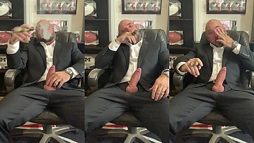 Jason Collins cigar smoking in a suit with a raging hard-on!