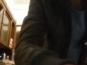 opening a bottle of beer with a bottle of mineral water