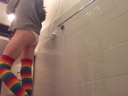 nerdy hipster transgirl covering herself in lube