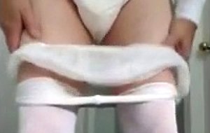 Diapered sissy in teddybear shortalls wetting diaper