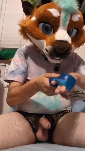 HairyHusky playing with his favorite blue sex toy in bed