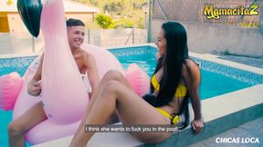 Latina girl bouncing on my big pink flamingo right by the pool