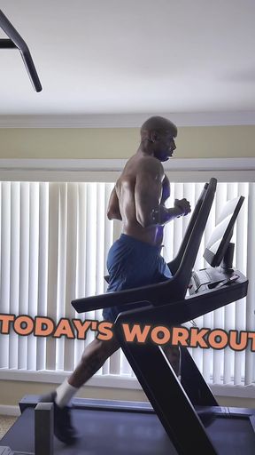 Athletic black fitness god Johnson flexes his muscles in a pro solo