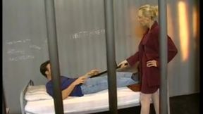 blonde jail guard britnee sucks nightstick before prisoners dick
