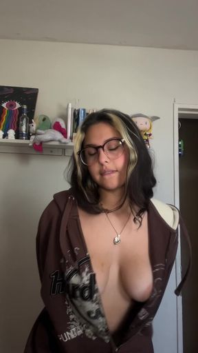 Latina teen with natural tits gets naked in a solo scene