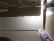 Self-made  strap-on in bathroom
