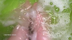 Feet in a bubble bath slowmo