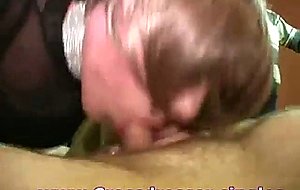 Two crossdressers sucking cock