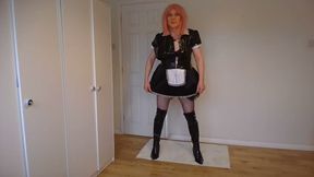 Strawberry blonde in maid's outfit and fishnets