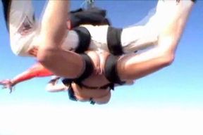 Extreme parachuting bitch who flashes her wet pussy high in the sky