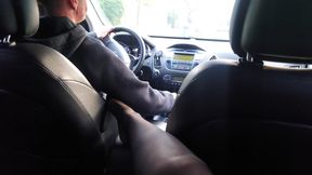 Hot milf teases a taxi driver in the car, in public, with her sexy legs in stockings