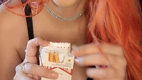 Slut redhead smoking cork in hot black lingerie - red lips