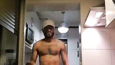 Muscular man has romantic sex in the kitchen