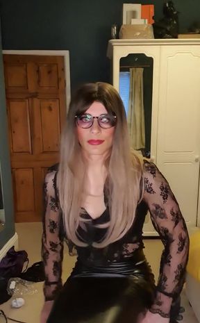 Dressed up in a sheer lace top and tight high waisted leather skirt Do you wish you could touch?