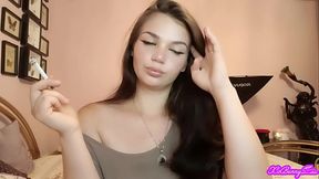 XO Bunny brunette latina with blue eyes smoking blowing smokein your face
