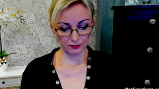 Blonde MILF takes off bra on webcam