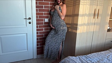 Pregnant. Just a naked pregnant tanned hot body in a tight dress. Boobs. Tits. Nipples. Titty fuck. My milky breasts and dark nipples want to take all your sperm