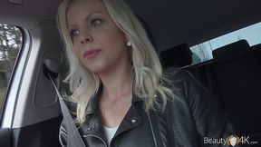 Nice blond hitchhiker Julia Parker gives a blowjob in the car to one kinky stranger