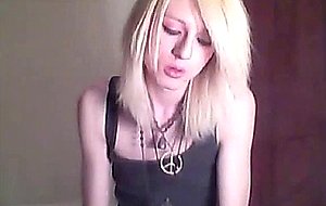 Platinum blonde emo tgirl does a bit of softcore posing