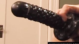 Bearded Tom Vacarro fists and fucks himself with a big dildo