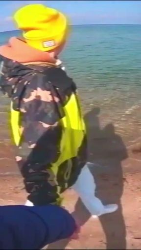 SISSY PET OUTDOORS - Walking your balls on the beach!   Clip 1