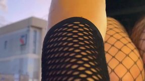 Strolling in public: fishnet stockings and black dress outfit