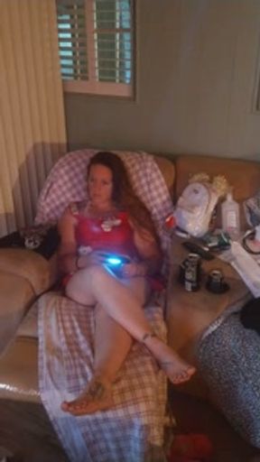 Pretty Girl In Mini Night Gown Playing Video Games, While Roommate Trys to Films Up Her Dress