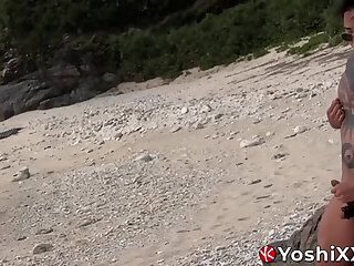 Naughty Japanese Yoshi Kawasaki tugs his cock and cums on the beach